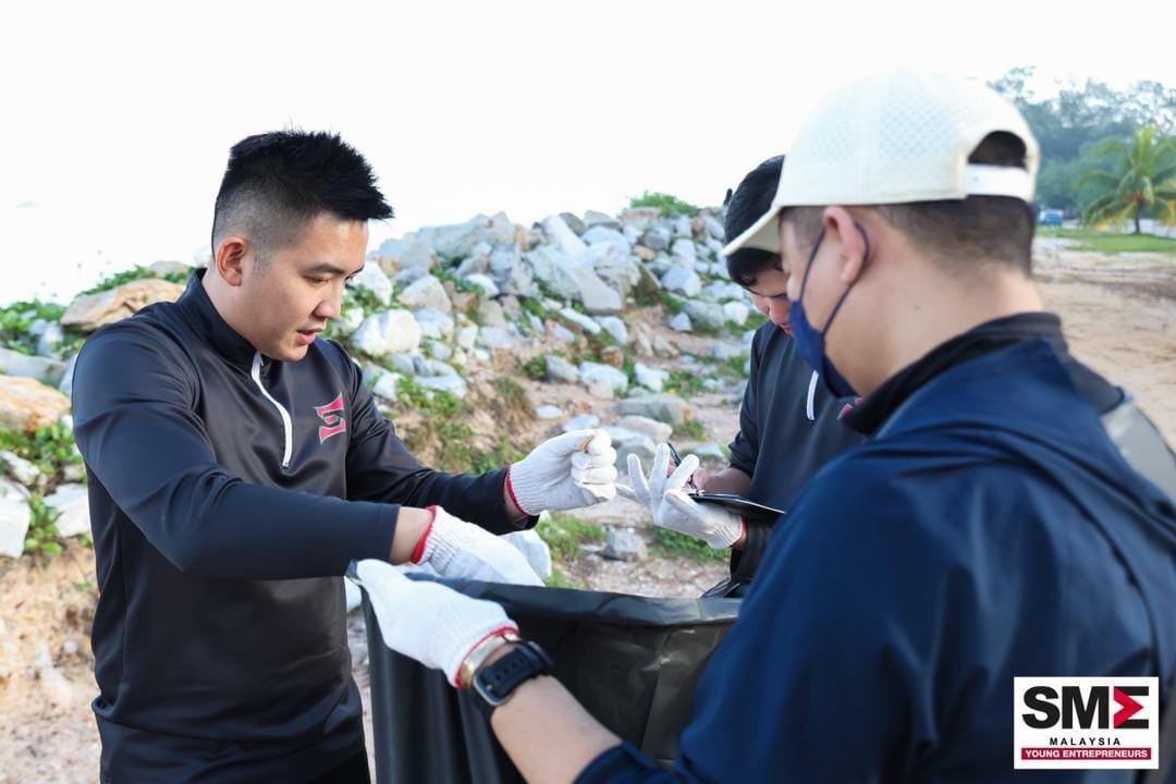 Boss A joining a beach clean-up