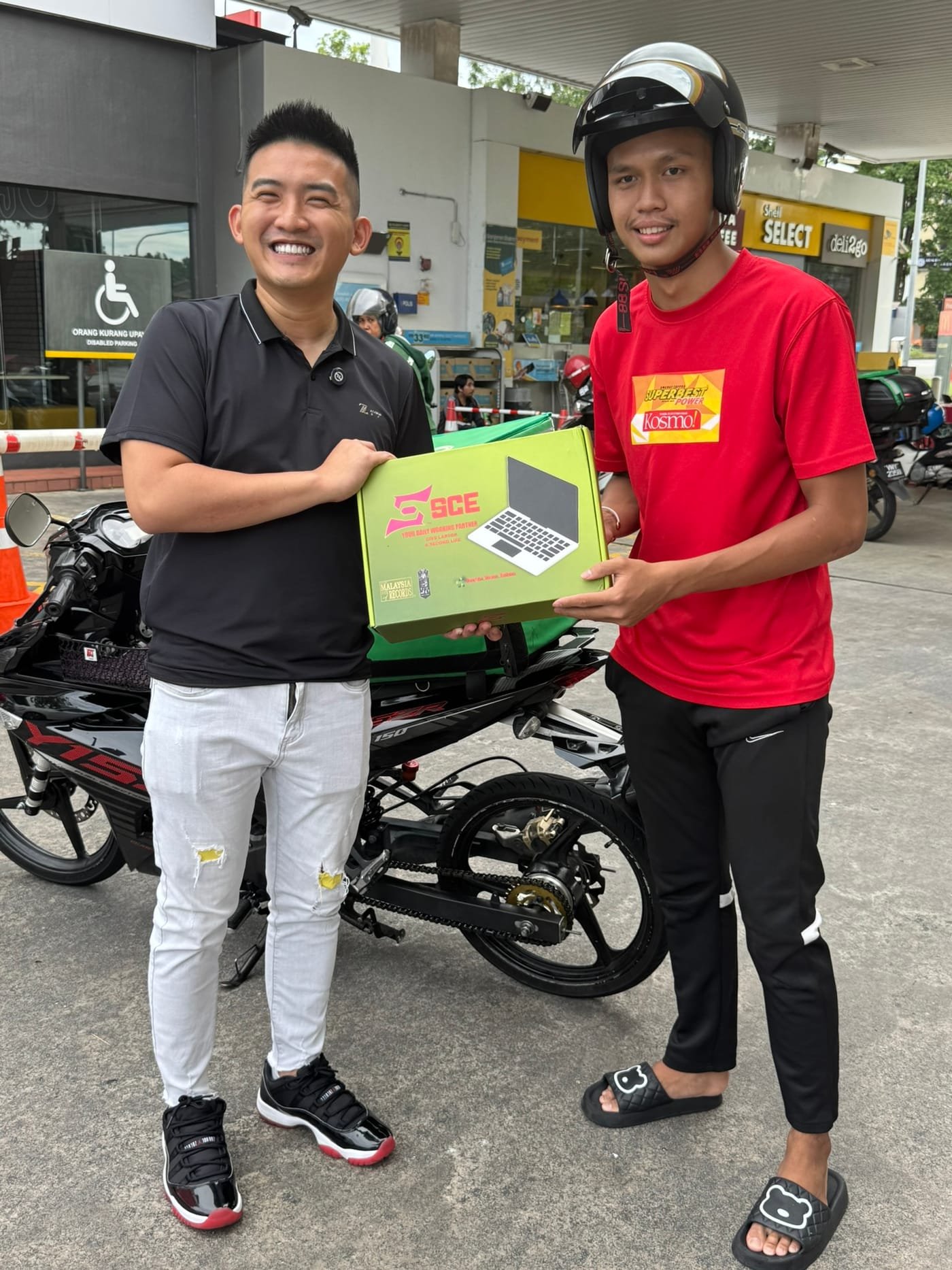 A delivery rider receiving support